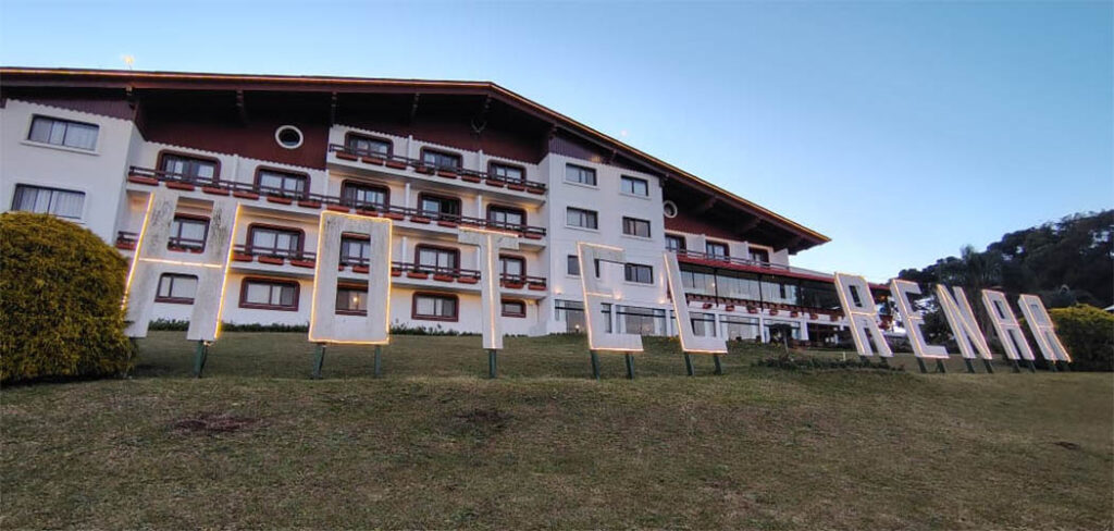 a building with a lawn and a sign